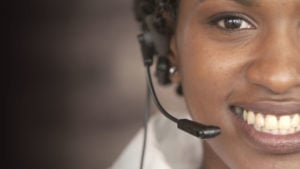 Female call center employee on the phone.