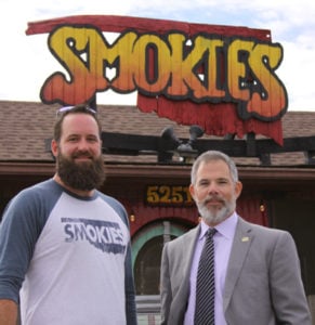 Aaron Latsos and Eddie Curran standing outside Smokie's BBQ