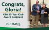 Gloria Ulbrich of Winfield, KS receives KBA Award for 50 years of service.