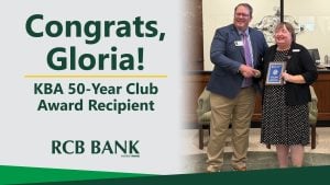 Gloria Ulbrich of Winfield, KS receives KBA Award for 50 years of service.