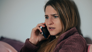 Concerned Scared Girl on Phone WEB