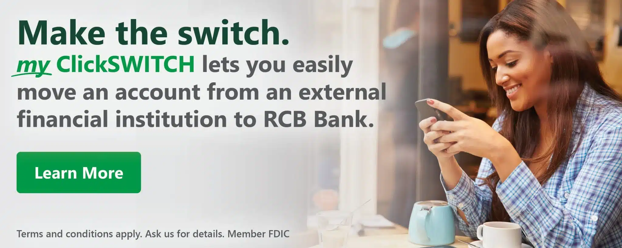 Woman at a cafe using a phone, text promotes switching accounts to RCB Bank with ClickSWITCH. Button reads "Learn More." Warm, inviting tone.