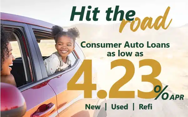 A promotional auto loan advertisement featuring a smiling young girl leaning out of the back seat window of a red SUV while an adult woman drives. The image uses bright natural sunlight and a warm travel-themed design. Large headline text reads “Hit the road” with “road” in gold script font. The ad promotes “Consumer Auto Loans as low as 4.23% APR” with bold oversized gold numbers highlighting the interest rate. Smaller text at the bottom reads “New | Used | Refi.” The background shows an outdoor scenic landscape with soft mountains and open-road vibes, emphasizing family travel, car ownership, affordable financing, vehicle refinancing, and road trip freedom.